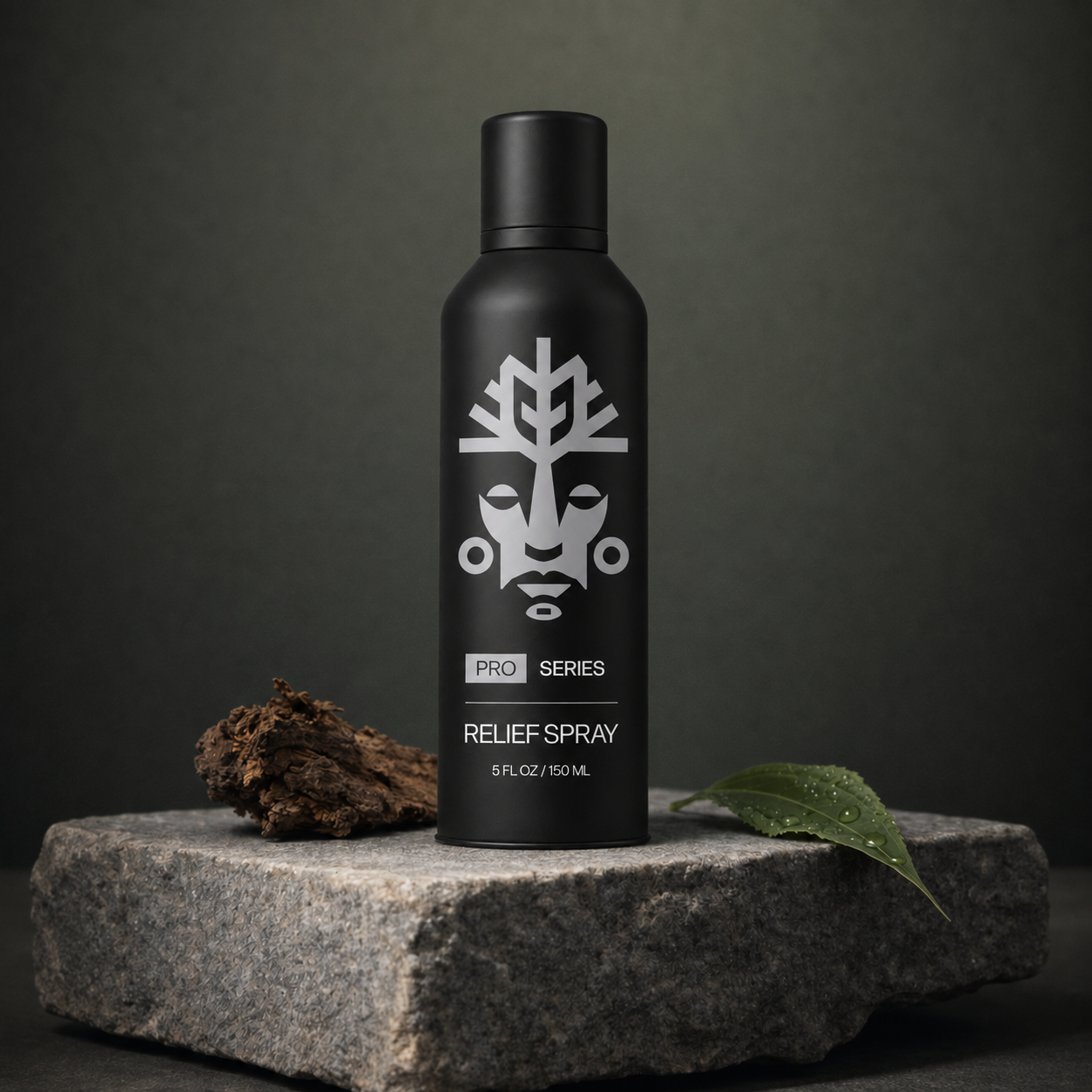 VitaliTree Pro Series Relief Spray on stone with tepezcohuite tree bark and a fresh botanical leaf